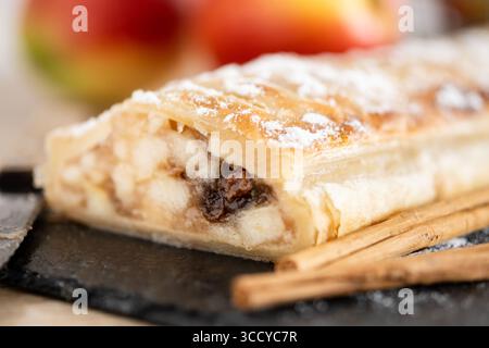 Homemade apple strudel on wooden table Stock Photo