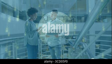 Two colleagues in business attire discussing details on office walkway with smartphone and tablet Stock Photo