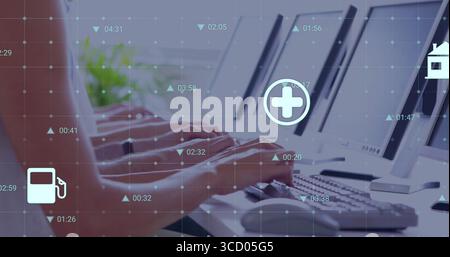 Typing casual attire hands working at office with monitors, keyboards and digital icons Stock Photo