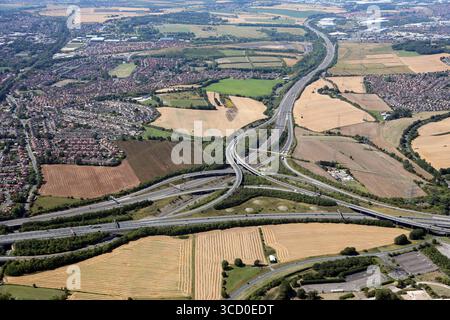 aerial view of Junction 32 of the M62 where the M62 Motorway interchanges with the A1(M) Motorway, Ferrybridge, West Yorkshire Stock Photo
