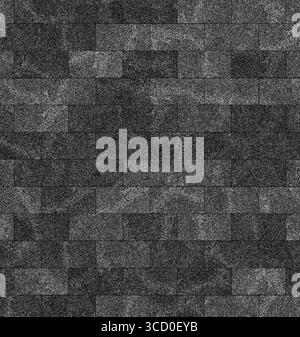Seamless texture of a dark gray brick wall creating a uniform background Stock Photo