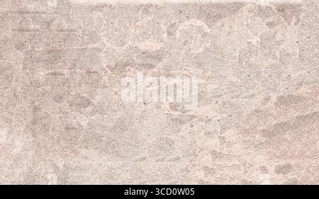 Beige textured wall with grunge stains creating abstract background, perfect for design projects Stock Photo