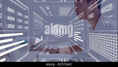 Typing Asian analyst processing holographic data panels at desk with keyboard and mouse, copy space Stock Photo