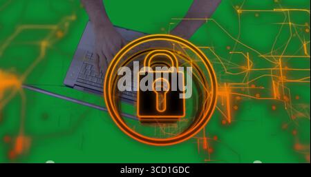 Typing mid-adult male hands using silver laptop keys on digital workspace, glowing lock icon Stock Photo