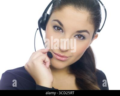 Beautiful girl is using headset, isolated on white Stock Photo