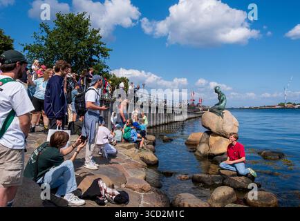 Tourists gather at Little Mermaid statue, Copenhagen, Denmark Stock Photo