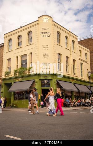 LONDON- JULY 28, 2025: Dishoom Permit Room bar cafe restaurant on Portobello Road in Notting Hill. Modern Indian food Stock Photo