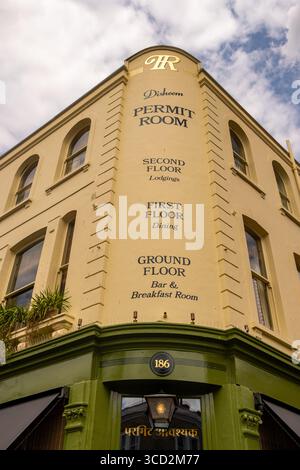 LONDON- JULY 28, 2025: Dishoom Permit Room bar cafe restaurant on Portobello Road in Notting Hill. Modern Indian food Stock Photo