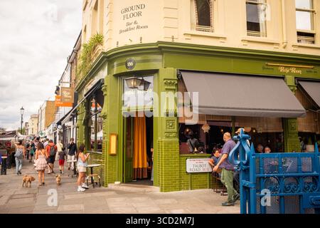 LONDON- JULY 28, 2025: Dishoom Permit Room bar cafe restaurant on Portobello Road in Notting Hill. Modern Indian food Stock Photo