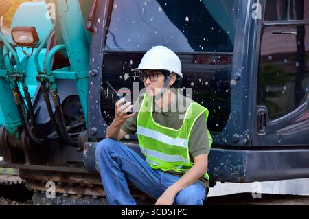 The concept of engineers supervising work at construction sites Stock Photo