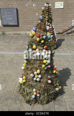 Easter eggs exposed in front of the parish church of St. Stephen in