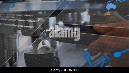 Touching metallic group head portafilter while displaying grid overlay in café, with code and map Stock Photo