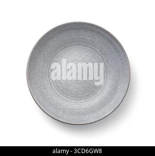 Top view of empty handmade trendy grey ceramic plate isolated on white Stock Photo