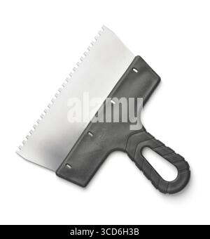 Top view of stainless steel notched spatula with black plastic handle isolated on white Stock Photo
