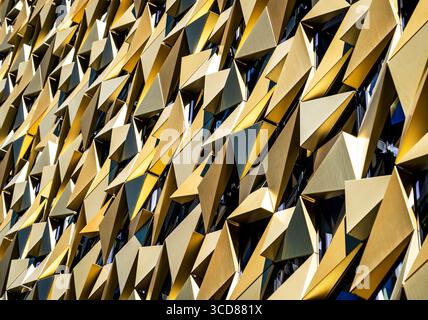 Abstract geometric pattern with gold metallic shapes Stock Photo