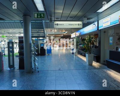 Retail Spaces Examples A general view showing escalator in Huanggang Port leading to border ...