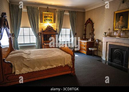 Master Bedroom and birthing bed in Teddy Roosevelt's birthplace home in New York Stock Photo