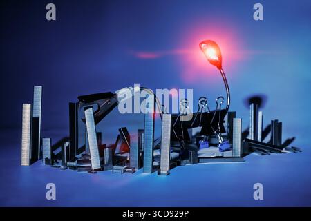 Conceptual monster done from paperclips and staples, staple city, with staple remover ogre monster, isolated on white background Stock Photo