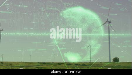 Holographic globe hovering above wind turbines over rural grassland, showing digital data visuals Stock Photo