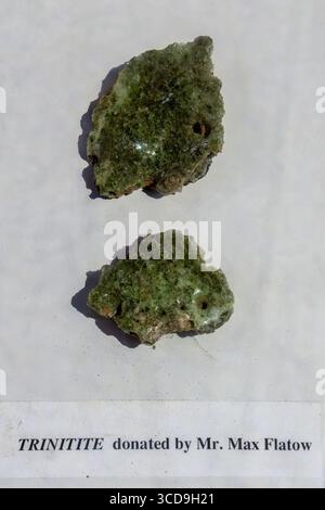 Trinitite from the first nuclear device test in the National Museum of Nuclear Science in Albuquerque, New Mexico, USA. Trinitite is a glassy residue formed from melted sand at the Trinity Test Site in New Mexico after the first atomic bomb test in 1945. It is mildly radioactive due to the presence of residual radioactive isotopes from the explosion. Stock Photo