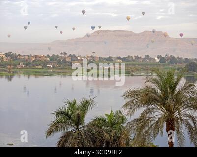 Hot-air balloons over the Nile in Luxor Stock Photo