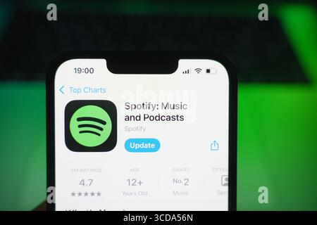 Roosendaal, The Netherlands - August 09, 2025: A smartphone displaying the logo of Spotify in the App Store. Stock Photo