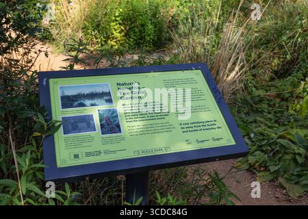 Notice board at the entrance to the Quiet Garden in Poole Park. Dorset, England UK Stock Photo