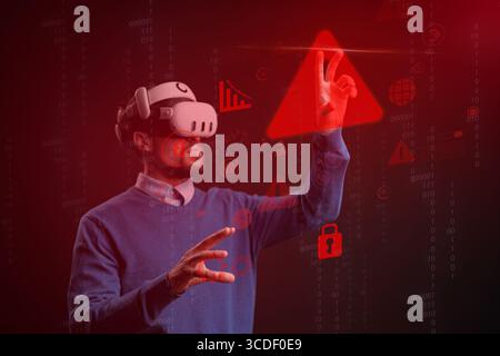 Man engaging with virtual reality technology in a futuristic environment with red graphics Stock Photo