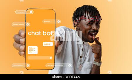 Engaging man showcasing chatbot features on smartphone against orange background in modern tech setup Stock Photo