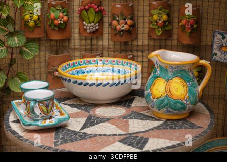 Colorful traditional Italian pottery in Monreale, Sicily, featuring bowls, jugs, and handcrafted ceramics perfect for display or use Stock Photo