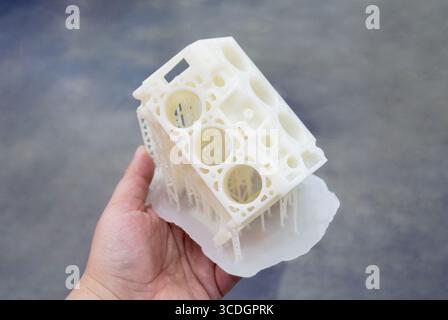 Detailed models in form of internal combustion engine printed on 3D printer from polymer close-up. Detailed object created by 3D printer using 3D printing method. Concept 3D Printing. SLA technology Stock Photo