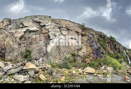 granite quarry. open-cast mine for industrial extracting of stones. panoramic view. Stock Photo