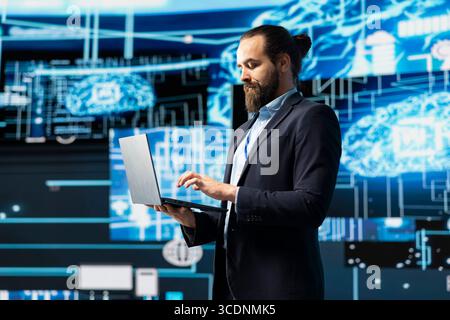 Engineer studying AI brain for data structures and predictive analytics, highlighting smart technology and machine learning for innovation and virtual intelligence. Algorithmic thinking. Stock Photo