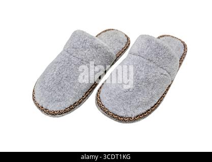 Slippers isolated on white background. Home, warm, gray slippers on felt soles. Home footwear, close-up. Stock Photo