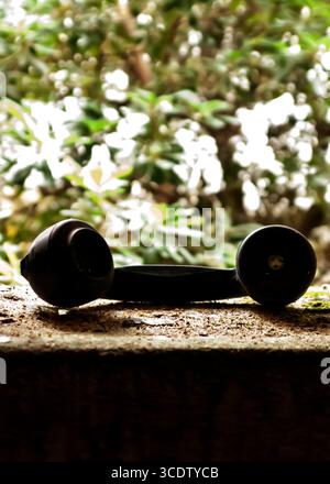 Phone Receiver Rest detail of modern telephone with blurred background Stock Photo - Alamy