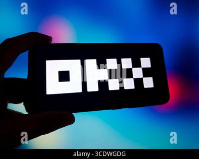SUQIAN, CHINA - AUGUST 14, 2025 - A illustration photo shows OKX logo displayed in a smartphone in Suqian, Jiangsu Province, China on August 14, 2025. Stock Photo