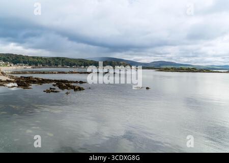 Storm clouds forming over Newtown Bay and Marine Parade Isle of Cumbrae Ayrshire Scotland UK. September 2024 Stock Photo