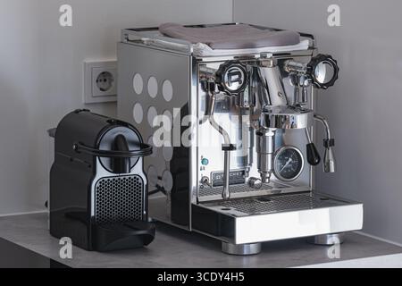 Nespresso and Rocket espresso machines on kitchen counter Stock Photo