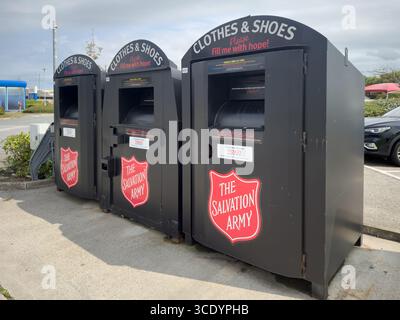 Three recycling bins for clothes and shoes, Formby Merseyside UK August 11th 2025 Stock Photo