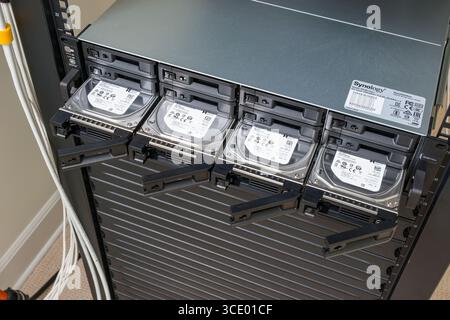 Hard disk trays in a Synology RackStation RS3617xs+ network attached storage computer server, USA Stock Photo