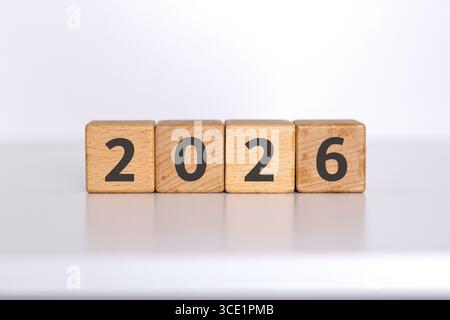 2026 written on wooden blocks. Turn of the new year. New year's resolution. Stock Photo