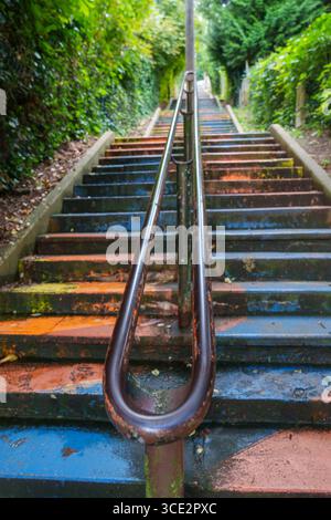 Vibrant Colourful Painted Stairway in Urban Setting, Artistic Steps Design Stock Photo