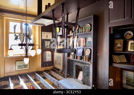 Interior of The Monro pub in Liverpool city centre,UK.A re-imagined 100 year old Dublin pub. Looking down through the rafters on to the floor below Stock Photo