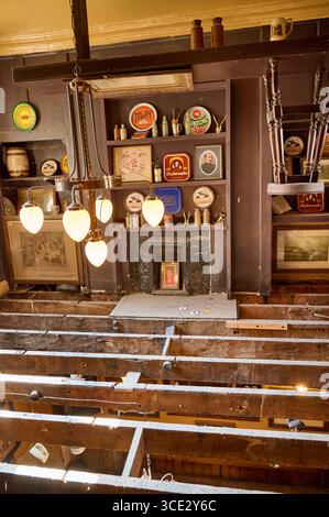 Interior of The Monro pub in Liverpool city centre,UK.A re-imagined 100 year old Dublin pub. Looking down through the rafters on to the floor below Stock Photo