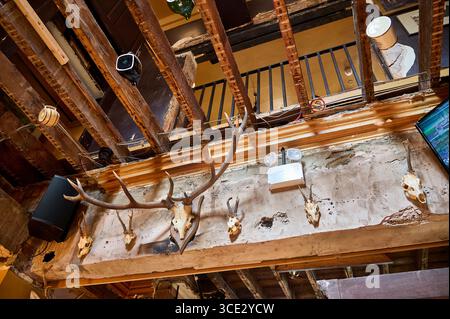 Interior of The Monro pub in Liverpool city centre,UK.A re-imagined 100 year old Dublin pub. Looking up  through the rafters to the floor above Stock Photo