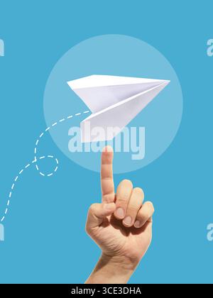 Collage of white paper plane balanced on fingertip with dotted flight path on blue background Stock Photo