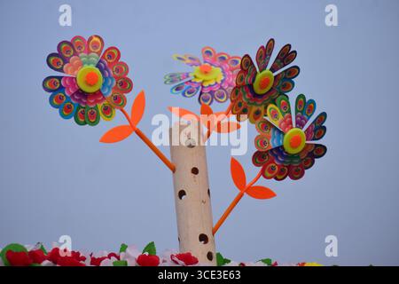 Multicolored Pinwheel Toy - Colorful spinning pinwheel toy with vibrant rainbow pattern for children Stock Photo