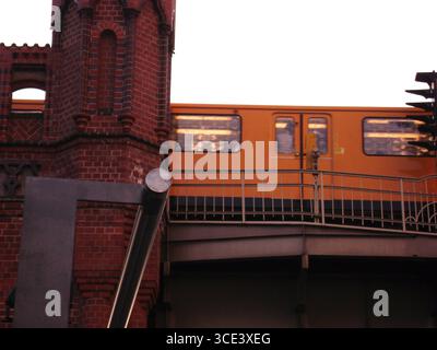 Yellow Subway over Bridge Stock Photo