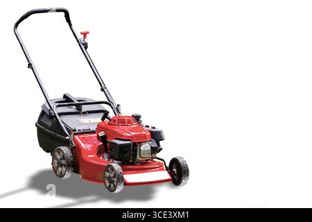 Red lawn mower isolated on white background. Stock Photo
