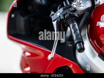 Clutch handle of a red fast motorcycle Stock Photo